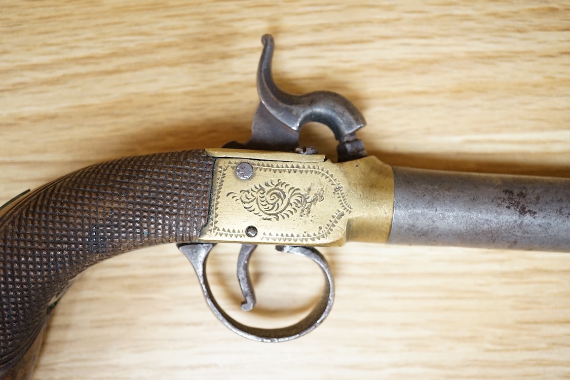 A boxlock percussion pocket pistol with turn off barrel, Birmingham proofs, engraved brass frame, and chequered rounded walnut grip